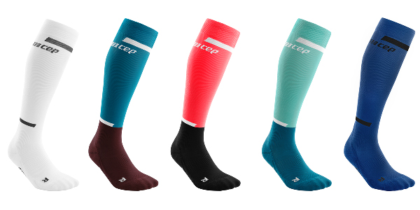 Run Compression Socks showing white, petrol/dark red, pin/black, ocean/petrol, and blue